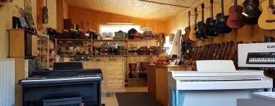 Unternehmen 1 Bild MUSIKHAUS KRAUS Musikschulen, Gesangsschulen am Wiesenfeld 3